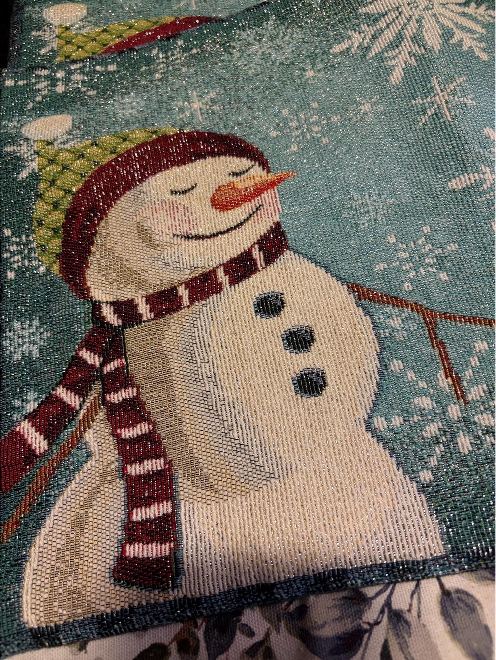 Midwood holiday tapestry placemats a snowman and snowflake motif.Set of 4